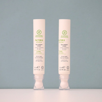 Vente en gros de tubes à presser souples vides personnalisés D19mm PE contenants de cosmétiques pour crème pour les yeux et brillant à lèvres avec applicateur en céramique