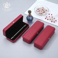 Boîte à bijoux octogonale avec doublure en velours et design élégant pour bagues, bracelets et colliers