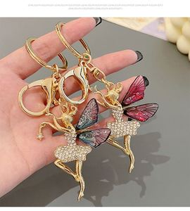 New Metal Diamond Dance Wings Girl Keychain High End Accessories Bag Pendant Car Keyring Small Jewelry <b>Key</b> <b>Chain</b> - Product Image 2
