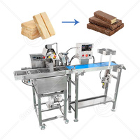 Enrobeuse automatique commerciale de chocolat, petite machine de recouvrement de chocolat pour la production de snacks