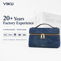 Tas Kosmetik Wanita YIKU Bahan Denim Kanvas Biru 100+ MOQ Logo Kustom OEM ODM 20 Tahun Pengalaman Pabrik Kapasitas Besar untuk Perjalanan
