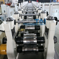 Machine de formage à rouleaux pour rails de guidage de portes de garage coulissantes en métal Putai