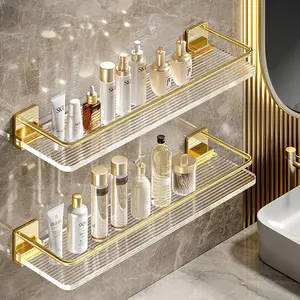 Scaffali in acrilico dorato di lusso leggero Set di accessori per doccia a parete in alluminio con ripiano in vetro per altri accessori