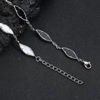 Bracelet de coquillage noir et blanc en acier inoxydable au design de luxe pour hommes et femmes, accessoires de bijoux en couches, vente en gros