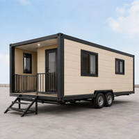 Mini-maison conteneur modulaire en acier sur roues avec design moderne pour entrepôt et habitation