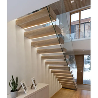 Escaliers flottants modernes pour la maison Escalier de décoration Design en acier au carbone Invisible Stringer en bois de chêne blanc Escalier d'intérieur