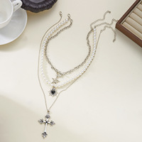 Collier ras-du-cou pour femme, style gothique vintage audacieux et sombre, avec croix en forme de cœur et fausse perle, chaîne en bambou, en alliage, transfrontalier