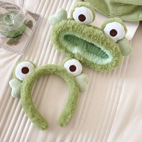 Bandeau en tissu peluche grenouille verte pour le lavage du visage et l'utilisation d'un masque, masque oculaire rafraîchissant d'été, design amusant
