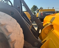 Chargeuse Volvo L180F d'occasion d'origine suédoise avec certification EPA CE, prix abordable, chargeuses agricoles d'occasion Volvo 180 150 105 à vendre