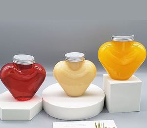 Venta al por mayor, 300ml, 400ml, 500ml, botella <span class=keywords><strong>en</strong></span> forma de corazón de <span class=keywords><strong>amor</strong></span>, botella de jugo de PET, botella de bebidas de agua vacía con tapas para negocios - Product Image 2