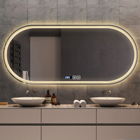 Miroir LED ovale avec halo frontal, commande tactile, heure, température, anti-buée, 3 modes pour chambre à coucher, salon, hôtel, vente en gros