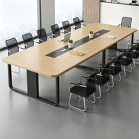 Table de collaboration de bureau moderne avec canal de rangement central et structure de support robuste et élégante