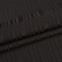 93% polyester 7% spandex couleur unie dty tissu côtelé tricot tissu côtelé irrégulier pour la fabrication de vêtements