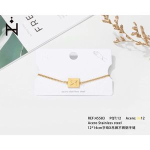 Bracciale in acciaio inossidabile con targhetta a forma di lettera X 12x14 cm per donna, gioielli alla moda - Product Image 1