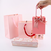 Vêtements avec poignée avec logo personnalisé emballage sacs en papier vêtements colorés imprimés sacs d'expédition femme cadeau personnalisé sacs fourre-tout en toile