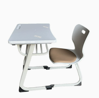 Ensemble table et chaise d'école réglables en hauteur avec bordure en mélamine, cadre en acier en forme de C et panier à livres pour salle de classe
