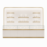 Vitrine à bijoux en verre incurvé sur mesure, cadre en métal rose doré, éclairage LED, pour magasin ou salle d'exposition