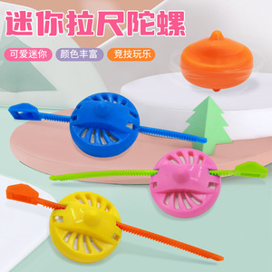 Mini Trompo de Juguete de Plástico Color Caramelo con Cuerda para Jalar para Niños de 2 a 4 Años Unisex - Product Image 1