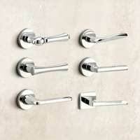 Poignée de porte à levier de luxe au design moderne ondulé, en alliage de zinc, finition chrome poli, rosette ronde, écusson séparé avec clé