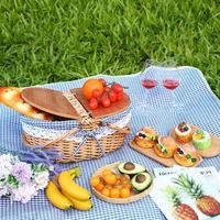 Petit panier de pique-nique en jonc de mer avec couvercle et poignées Cible Grand panier en osier Oem Vente en gros de paniers en vrac Basquet Concept Panier à vélo