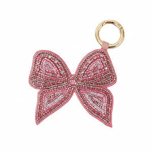 Pookie design pink and white <b>coloured</b> seed beaded embroidery keychain and keyring and <b>bag</b> accessories from India - Product Image 1