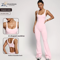 Combinaison de yoga une pièce en gros pour femme, col en U, dos évidé, jambe évasée, côtelée, pour la gym