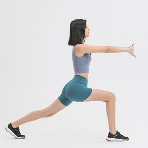 OEM LULU Running Gym 2022 nuevos pantalones cortos de Yoga desnudos de Color puro cintura alta Levantamiento de cadera apretado estiramiento entrenamiento deportes pantalones calientes para mujeres - Product Image 3