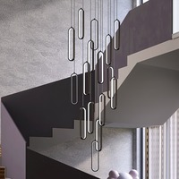 Lustre ovale noir minimaliste simple moderne pour villas en duplex et appartements loft avec long plafond