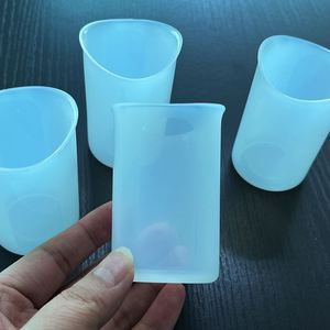 Juego de Tazas Medidoras de Silicona de 60 ml, Flexibles y Translúcidas, Utensilios de Cocina de 2 oz - Product Image 1