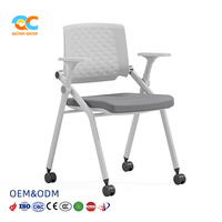 Chaise de bureau ergonomique moderne et minimaliste en maille avec support lombaire, accoudoirs rotatifs réglables en hauteur, structure en acier, base en nylon, noire