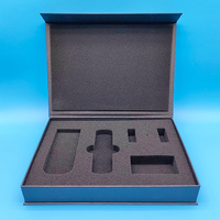 Boîte cadeau noire avec insert en mousse Logo en carton rigide UV Texture magnétique Papier Stratification mate et revêtement UV