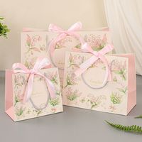 Sacs en papier cadeau de luxe écologiques avec logo personnalisé et poignée en ruban pour bijoux