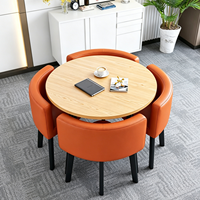 Table basse ronde moderne, durable et minimaliste pour réception et négociation, avec ensemble de chaises pour espace lounge de bureau