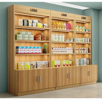 Vitrine murale moderne personnalisée pour cosmétiques, idéale pour les centres commerciaux, les parfumeries et les présentoirs de beauté