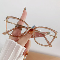 Monture de lunettes en métal de haute qualité style œil de chat, tendance pour jeunes, confortable et disponible pour le campus