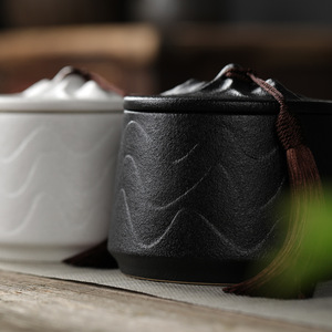 Mountain Shape Lid Matte Ceramic Tea Canister with Embossed Wave Pattern and Tassel Decor Airtight Zen Style Storage Jar - Product Image 4