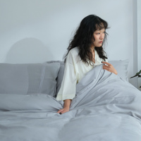 Parure de draps ajustables de luxe rafraîchissante en 100 % bambou Lyocell 300T tissé satiné, couleur unie, écologique, taille personnalisable, respirante pour la maison