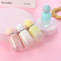 Flacon de parfum en verre rond de luxe de 30 ml avec bouchon en forme de boule de différentes couleurs