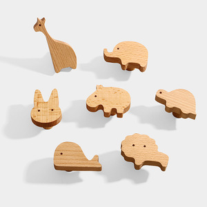 Poignées de meuble en bois massif en forme d'animal pour chambres d'enfants, design minimaliste et écologique - Product Image 1