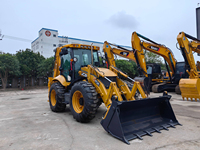 Chargeuse-pelleteuse JCB 4CX en bon état, puissance 91 kW, garantie 12 mois, testée et inspectée
