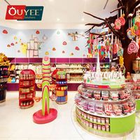Comptoir de confiserie OUYEE personnalisé pour un montage facile, design de kiosque de centre commercial pour bonbons et sucettes, mobilier de présentation pour magasin de bonbons