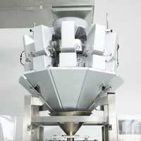 Machine à emballer verticale multifonctionnelle pour le pesage de boulettes de viande saccadées et de nourriture pour animaux de compagnie