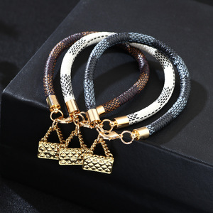 <b>Leather</b> <b>Bracelet</b> With Mini Bag Charm Gold Plated Checkerboard Pattern Black White Brown Gift Jewelry - Product Image 1