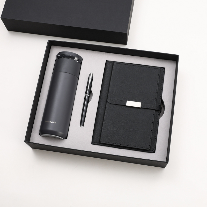 Lok bouton tasse signe stylo carnet noir