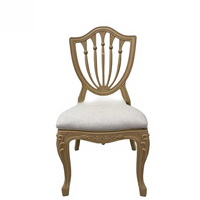 Chaises de salle à manger élégantes en résine plastique couleur bois, avec coussin de siège en tissu, idéales pour les mariages, les hôtels et les réunions.