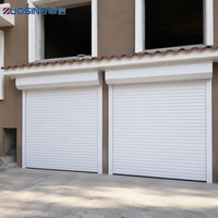 Volet roulant de garage en aluminium avec système de déverrouillage manuel à manivelle pour fonction de coupure de courant