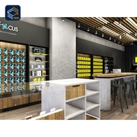 Comptoir de présentation en verre trempé élégant et haut de gamme pour magasin de téléphonie mobile, avec armoire à accessoires pour écouteurs