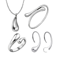Ensemble de bijoux Goutte de pluie quatre pièces : bagues torsadées et gouttelettes avec bracelet en alliage – Cadeau de Noël tendance pour les fêtes