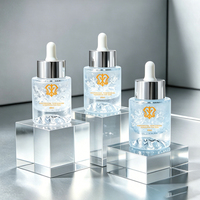 Flacon compte-gouttes rond en verre de 40 ml avec pipette à tête en caoutchouc pour l'aromathérapie, logo personnalisé