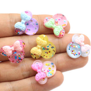 100 piezas de dijes de resina de dibujos animados con cabeza de ratón, cabujones de resina de base plana para decoración de uñas, bricolaje, fundas de teléfono móvil y adornos para lazos de pelo - Product Image 1